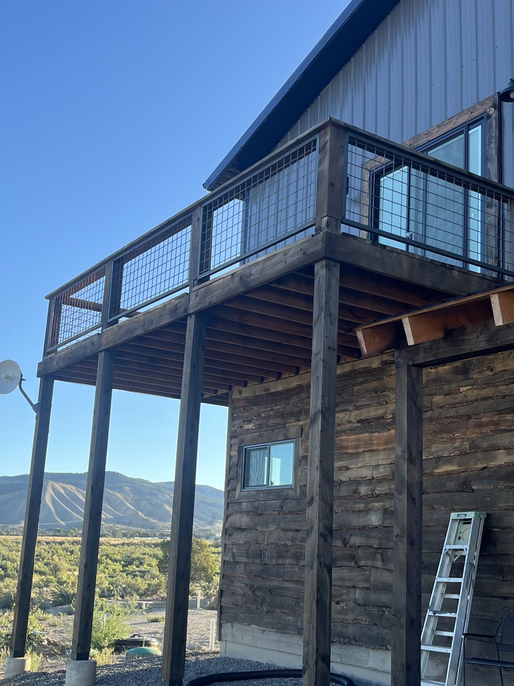 Deck with live-edge siding
