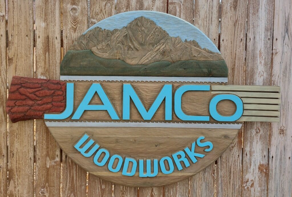 Hand-carved and painted JAMCo Woodworks sign