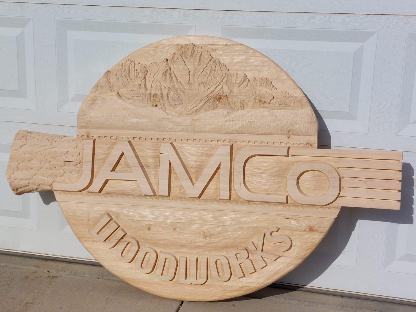 The carved JAMCo sign before painting